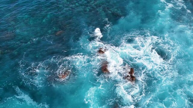 Atlantic ocean waves, rocks, cliffs, waves and turquoise water in Atlantic ocean, Mosteiros, Azores islands. Aerial 4K drone video footage of Acores archipelago