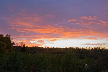 Magical sunset in winter in January over Bredebolet in Skaraborg in Vaestra Goetaland in Sweden on a cold day