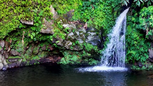 Poco Azul the blue lagoon of the Azores, Sao Miguel, Portugal. Aerial 4K drone video footage of Poco Azul waterfall