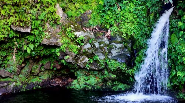 Poco Azul the blue lagoon of the Azores, Sao Miguel, Portugal. Aerial 4K drone video footage of Poco Azul waterfall