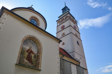 Cathedral of the Nativity of the Blessed Virgin Mary in Żywiec – a temple built in the fifteenth century with a high tower with a clock on it © Pawel Filusz
