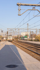 Train is on the tracks at a train station
