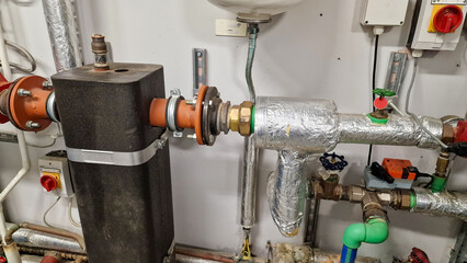 View of industrial piping in a plant room