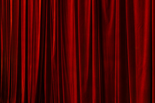 Red curtain in theatre background