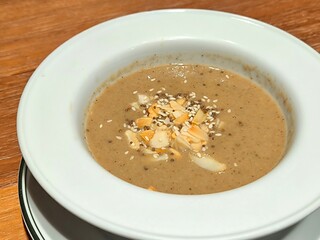 Three Mushrooms Soup. Soup with shiitake mushroom, golden needle mushroom and eryngii mushroom. Healthy food