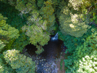 Poco Azul the blue lagoon of the Azores, Sao Miguel, Portugal. Aerial drone view of Poco Azul waterfall