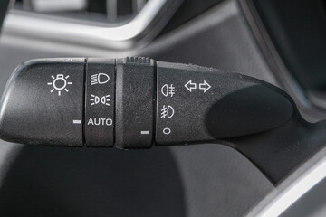 Car turn signal switch with light switch © Armands photography