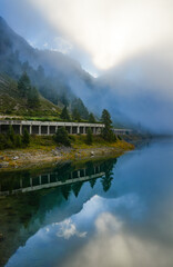 Fototapeta premium Lago Fedaia - Fedaia Lake, Dolomiti mountain Italy. Marmolada massif in Trentino Alto Adige, South Tyrol italian Dolomites