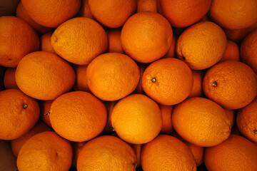 Oranges are type of citrus fruit on market stall