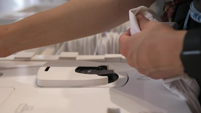 Self-service cash register without a seller. A close-up of the purchase of goods at the self-service checkout.