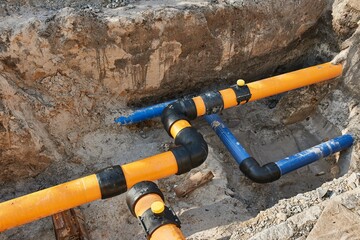 Construction site utility pipes hole