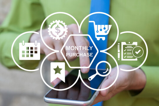 Man using smartphone and working on virtual touch screen sees inscription: MONTHLY PURCHASE. Monthly Purchase Business Finance concept.