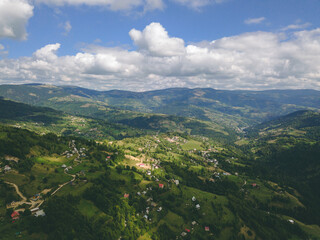 Naklejka premium Misty Autumn Morning in a Mountain Village