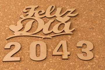 Happy new year 2043 on wooden background