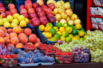 the counter of the store on the street with fresh fruits