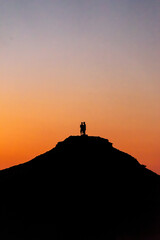 People on a hill Silhoutte