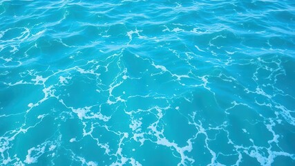 Obraz premium Pure blue turquoise water with gentle foam and rolling waves, serene ocean backdrop for design projects, travel brochures, relaxation, travel, serene
