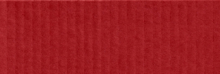 Fototapeta premium Red cardboard texture with a festive Christmas touch