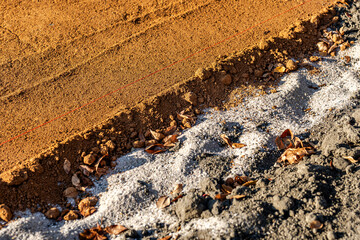 Construction photos of new baseball, softball, sports field red clay pitchers mound and infield...