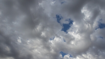Beautiful dark dramatic sky with stormy clouds before rain or snow. Thunderstorm heaven landscape. Timelapse. High quality photo