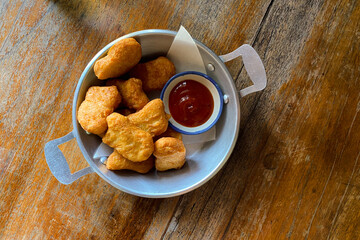 Fresh Crispy Chicken Nuggets Served with Ketchup