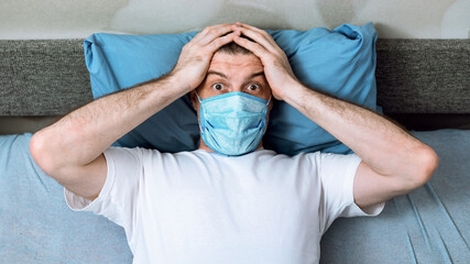 Coronavirus Panic. Scared Man Cupping Head In Hands Looking At Camera In Fear Of Covid-19 Virus...