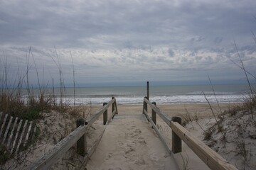 Outer Banks Beach Walkway with View of Ocean and Cloudy Sky