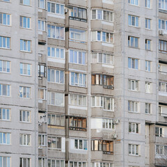 Partial facade of a panel multi-story apartment building, an example of Soviet panel architecture in Saint Petersburg, Russia.