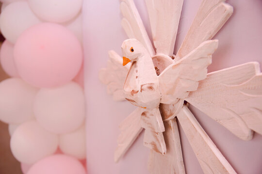 Divine Holy Spirit of Wooden Radiance. Wooden dove. Religious article, christening. decorative object, religious decoration, mandala, wooden white bird, radiance, easter, white dove - Powered by Adobe