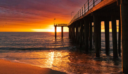 Dramatic sunrise over Ocean Grove pier