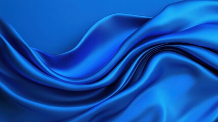 A beautiful wave of deep blue silk fabric, showcasing luxurious texture and elegant folds, perfect for backgrounds or design projects.