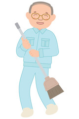 ほうきで掃除をする作業服姿のシニア男性