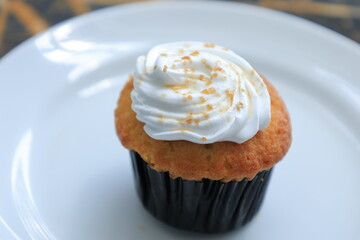 Alluring Temptation: Delicious Sweet Cupcake on Plate