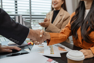 Businessmen shaking hands after agreeing to sign a business contract, They were shaking hands to congratulate each other on their pleasure in doing business together, handshake, workplace