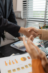 Businessmen shaking hands after agreeing to sign a business contract, They were shaking hands to congratulate each other on their pleasure in doing business together, handshake, workplace