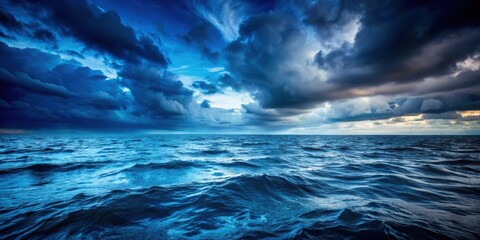 Rough blue ocean under dark sky , stormy, waves, water, clouds, dramatic, nature, sea, atmospheric, moody, turbulent, gloomy