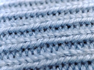 Blue knitted wool texture. Soft and warm sweater seamless pattern. Texture background