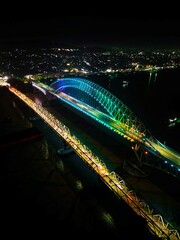 The appearance of the Mahakam Bridge from the air at night, the bridge is colorful like a rainbow at night in samarinda, east borneo