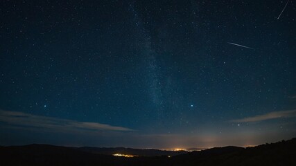 Fototapeta premium The night sky is lit by the moonlight