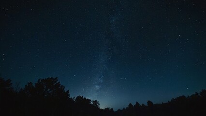 Naklejka premium The night sky is lit by the moonlight