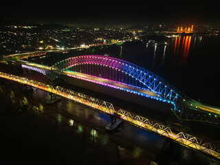 The appearance of the Mahakam Bridge from the air at night, the bridge is colorful like a rainbow at night in samarinda, east borneo