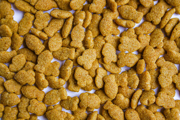 Dry cat food texture background