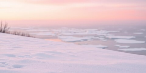 Obraz premium Soft pastel pink hues on a snowy landscape, with delicate snowflakes and icy water in the distance, snowflakes, serene, snowy landscape
