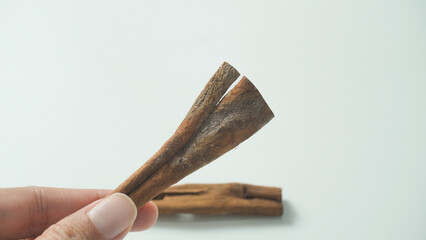 cinnamon stick on isolated white background