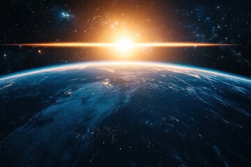 Obraz premium A stunning view of Earth from space, with a bright sun rising over the horizon.