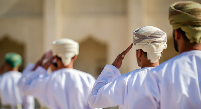 Omani soldiers giving salute during ceremony military, glory and honor, dignified military uniform