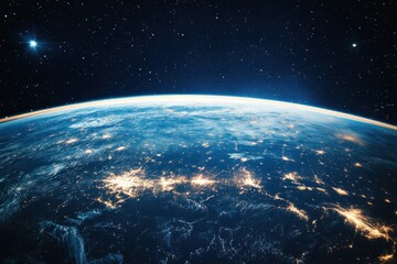 Obraz premium Earth at night from space, showing city lights and stars.