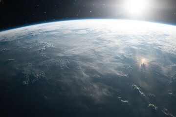 Earth from space with clouds and sun.