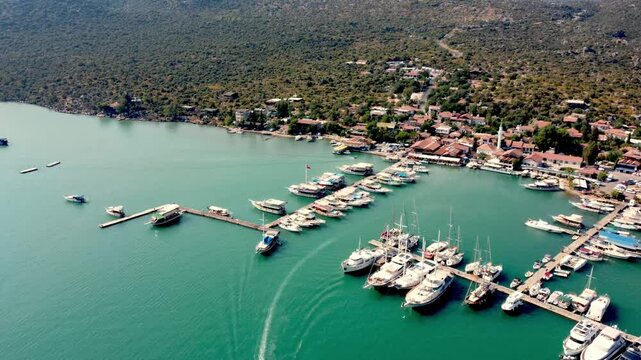 Stunning aerial view of Demre Harbour, gateway to Turkey&rsquo;s Kekova and Simena islands, showcasing turquoise waters and anchored boats