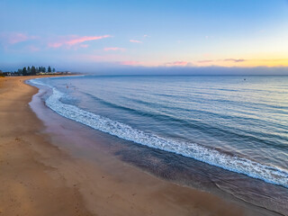 Foggy sunrise at the seaside